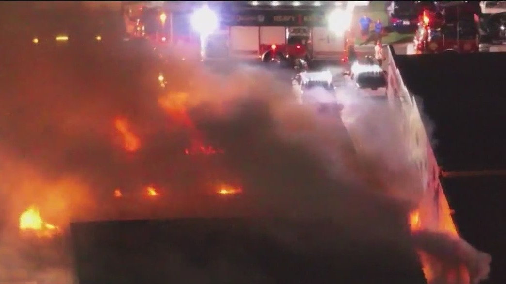 Large fire burns near Camping World Stadium